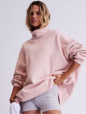 A cut above mock neck pullover